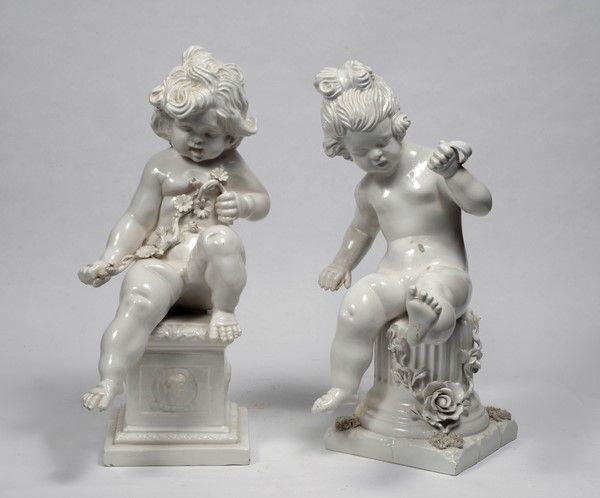 Coppia di Putti Festanti