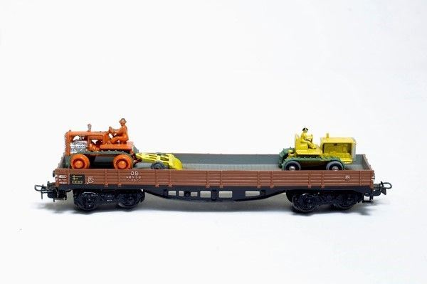 Carro merci a sponde basse con ruspe  Marklin