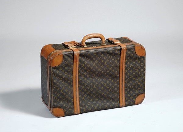 Valigia semirigida Louis Vuitton in tela monogrammata, chiusura a cerniera e cinghie in cuoio, dettagli in metallo,  cm. 44,5x69x22