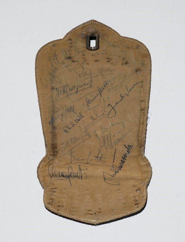 Parte di borsa con autografi di piloti