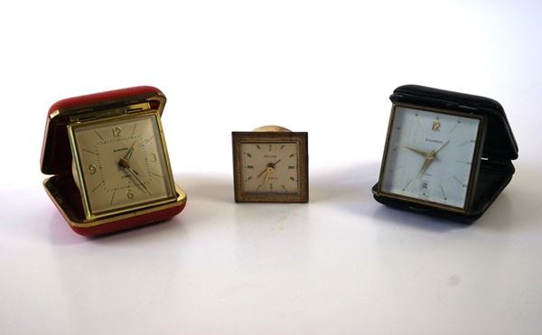 Tre orologi sveglia da viaggio