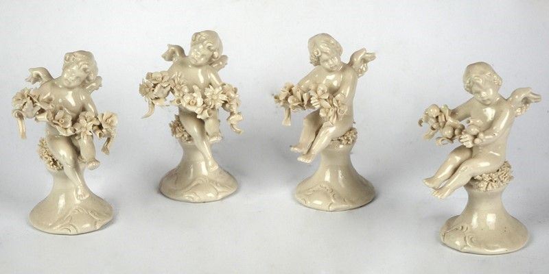 Lotto Composto da Quattro Sculturine con Putti