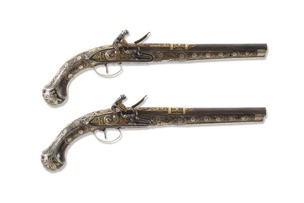 Importante e rara coppia di pistole a pietra focaia / AN IMPORTANT RARE PAIR OF FLINTLOCK PISTOLS