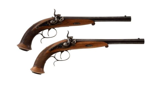 Coppia di pistole ad avancarica da tiro / A PAIR OF MUZZLE-LOADING TARGET PISTOLS