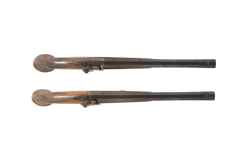 Coppia di Pistole Ad Avancarica da Tiro / a Pair Of Muzzle-loading Target Pistols