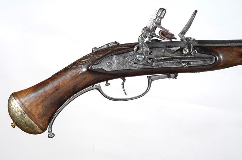 Pistola a Ripetizione a Pietra Focaia