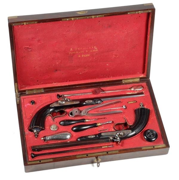 A cased pair of target percussion pistols                                       