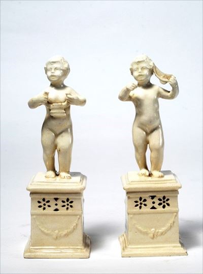 Coppia di Putti su Plinto