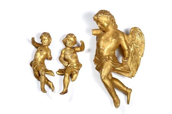 Due putti in legno intagliato e dorato, un angelo (rotture)  - Auction Arredi, Oggettistica e Dipinti - Galleria Pananti Casa d'Aste