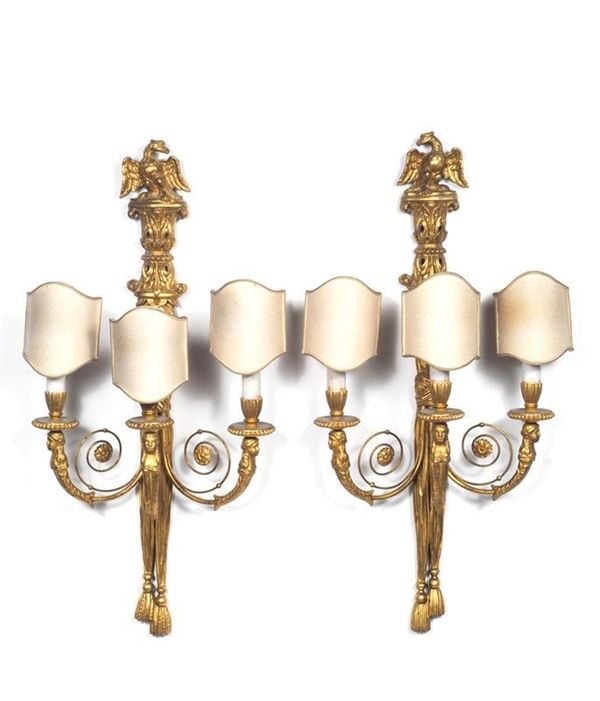 Coppia di appliques a tre luci
