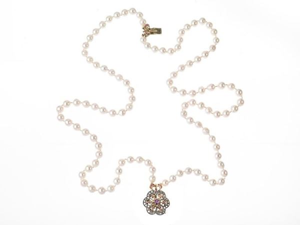 Collana perle, rubini e dimanti