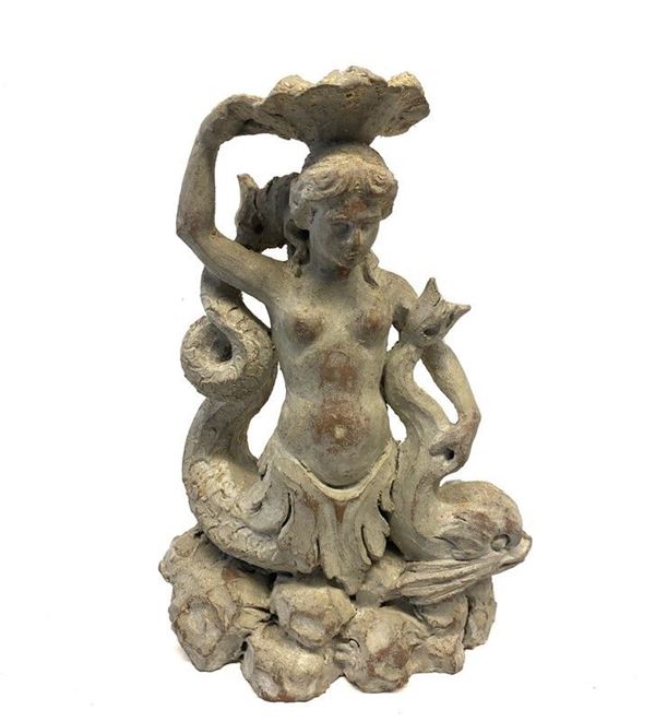 Sirena con delfino