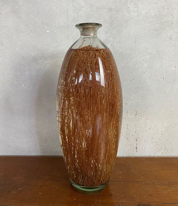 Grande vaso con frumento sotto olio