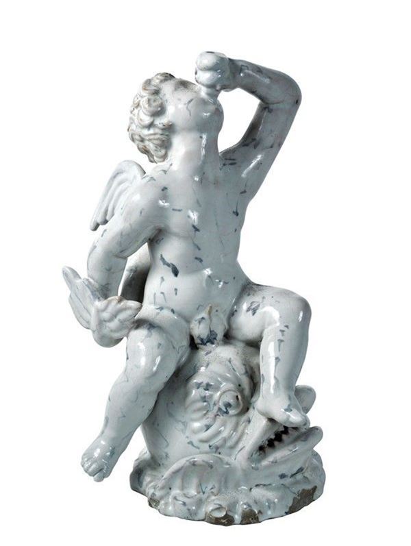 Putto su delfino