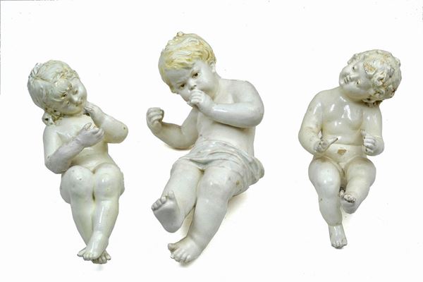 Lotto composto da tre putti