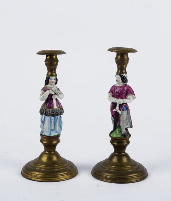 Coppia di candelieri in bronzo