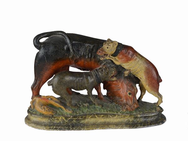 Dogs attacking a bull