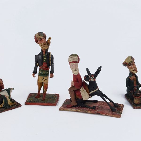 Quattro figure di arabi