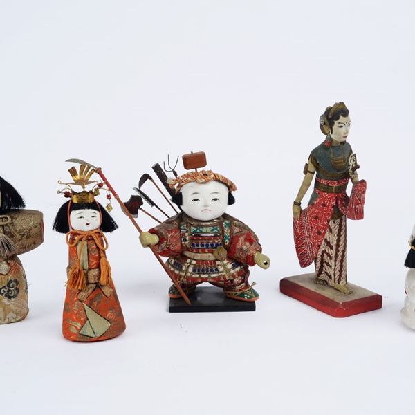 Five small sculptures of oriental figures
