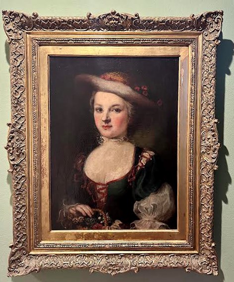 Ritratto di giovane donna con cesto di fiori