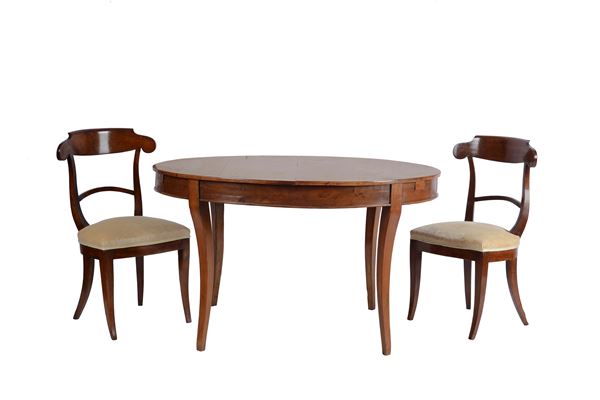 Six chairs and an oval table