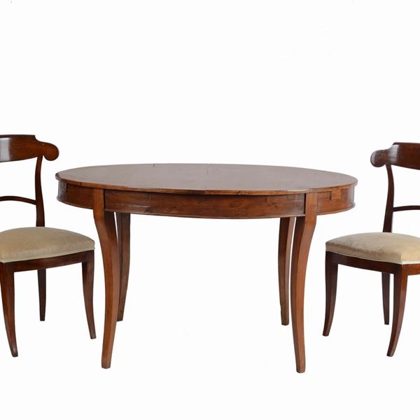 Six chairs and an oval table