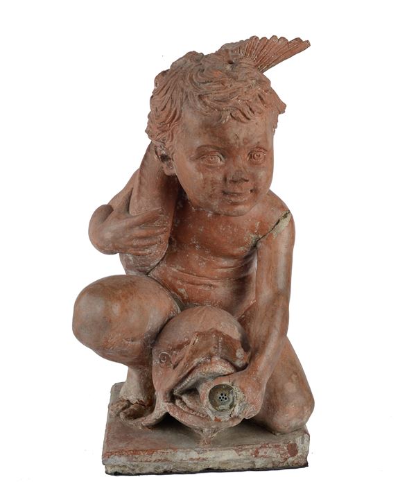 Bocca di fontana con putto ridente che abbraccia un delfino