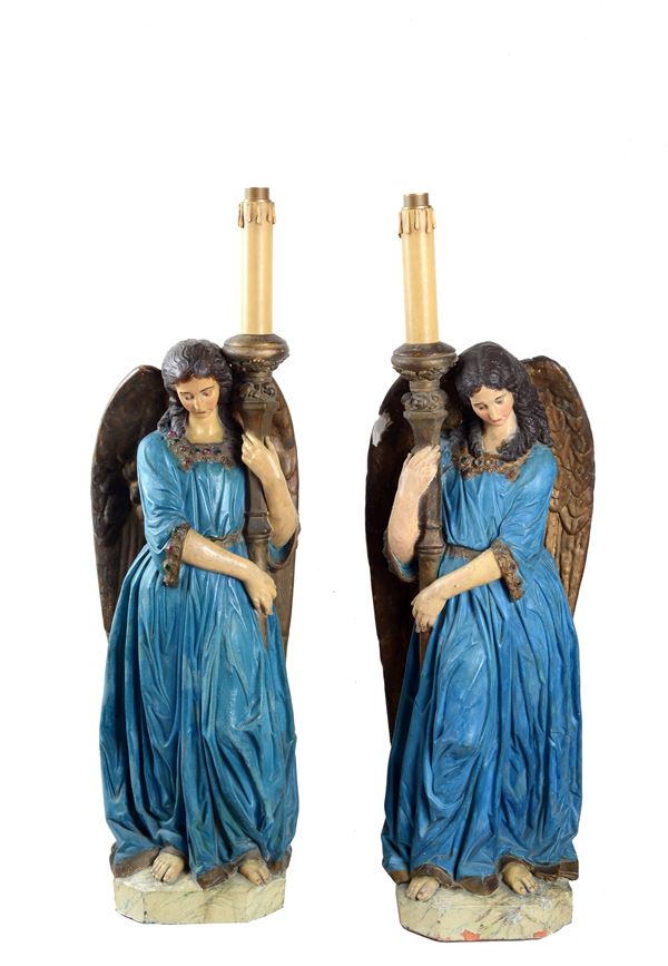 Pair of candle-bearing angels