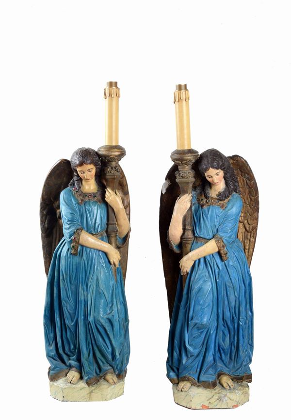 Coppia di angeli portacero