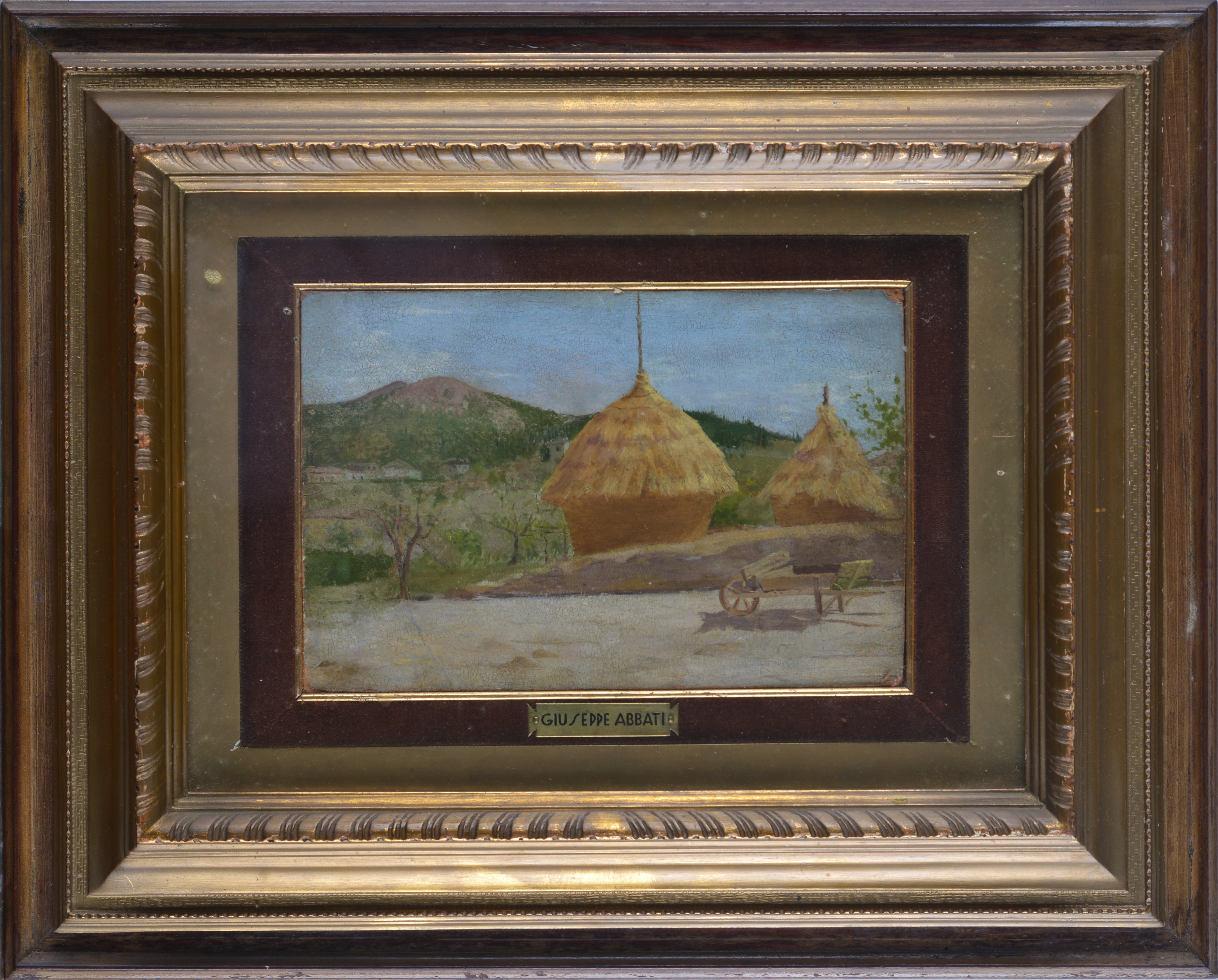 Paesaggio con covoni e carretto